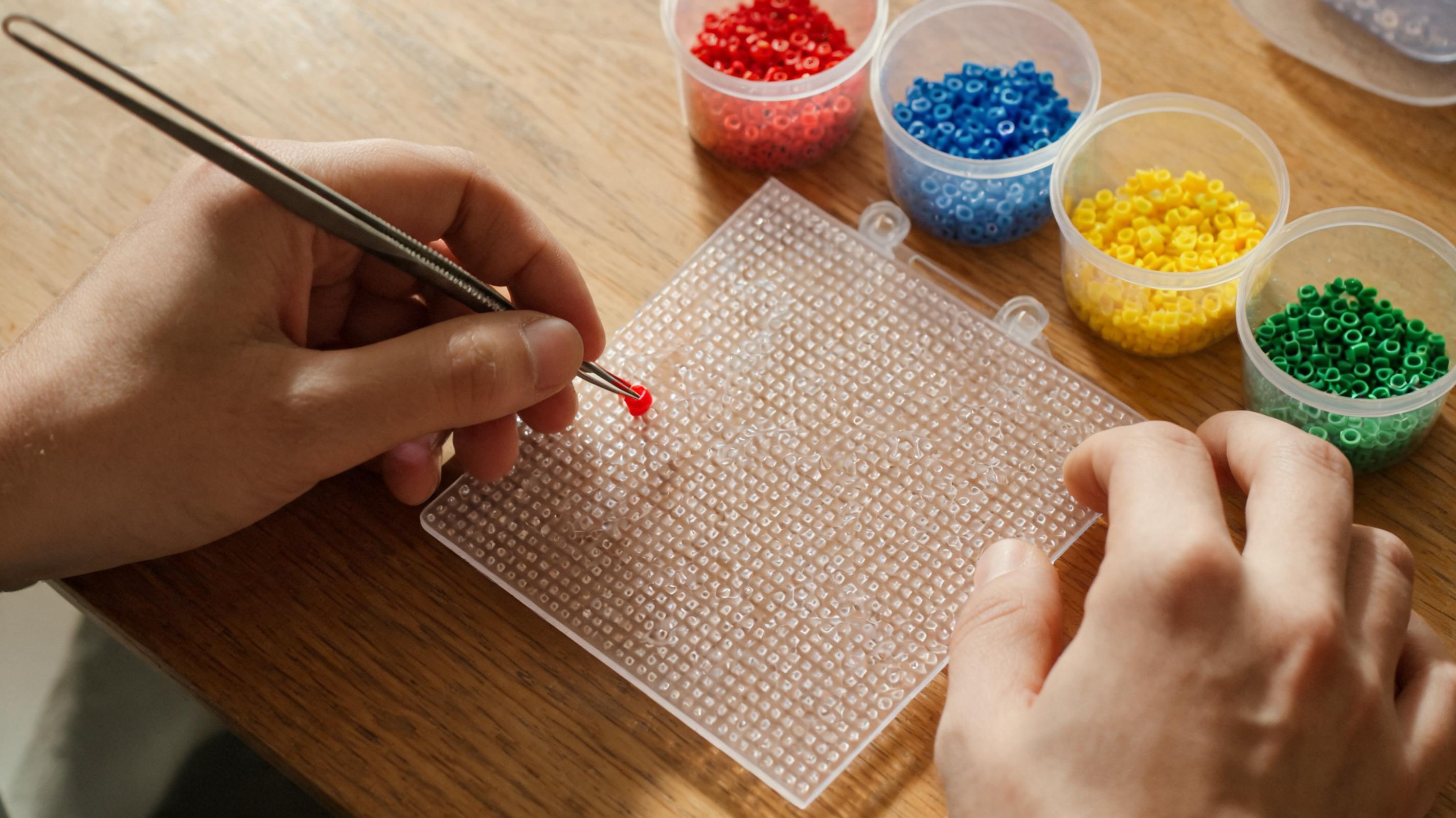 Blank digital peg board with first beads placed